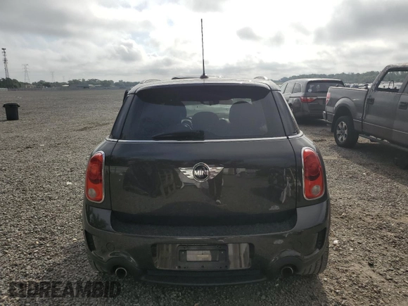 2015 MINI Countryman S with VIN WMWZC3C57FWP52868, listed as a Copart auction lot 54909085 with 68,003 mi miles and Salvage title. Bid and sale history available at DreamBid. Image 6.