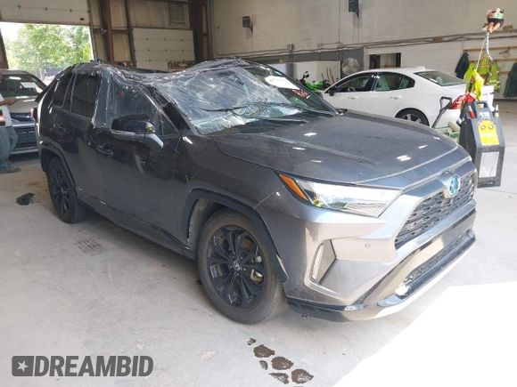 2022 Toyota RAV4 Hybrid XSE z VIN 4T3E6RFV4NU092518, wystawiony jako IAAI lot #42798470 z przebiegiem 51 581 mil mil oraz . Historia ofert i sprzedaży dostępna na DreamBid. Obrazek 1.