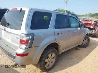 2009 Mercury Mariner z VIN 4M2CU91769KJ21418, wystawiony jako IAAI lot #42378151 z przebiegiem 200 771 mil mil oraz . Historia ofert i sprzedaży dostępna na DreamBid. Obrazek 4.
