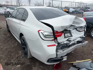 2016 BMW 7 Series 740i with VIN WBA7E2C50GG714647, listed as a IAAI auction lot 41745442 with 134,399 mi miles and . Bid and sale history available at carsss.com. Image 3.