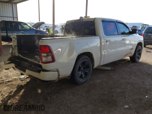 2022 Ram 1500 Big Horn with VIN 1C6SRFFTXNN351308, listed as a IAAI auction lot 41424332 with 271,908 mi miles and . Bid and sale history available at DreamBid. Image 4.