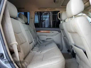 2006 Lexus GX 470 z VIN JTJBT20X960120748, wystawiony jako Copart lot #60102405 z przebiegiem 242 521 mil mil oraz Czysty tytuł • Clean title. Historia ofert i sprzedaży dostępna na DreamBid. Obrazek 11.