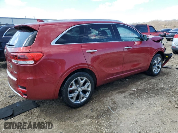 2017 Kia Sorento SX z VIN 5XYPK4A59HG225887, wystawiony jako Copart lot #50325005 z przebiegiem 122 419 mil mil oraz Szkoda całkowita • Salvage title. Historia ofert i sprzedaży dostępna na DreamBid. Obrazek 3.