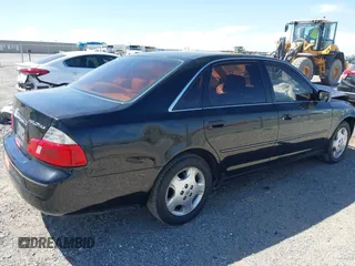 2004 Toyota Avalon XL with VIN 4T1BF28B14U380694, listed as a IAAI auction lot 42022929 with 328,255 mi miles and . Bid and sale history available at DreamBid. Image 4.