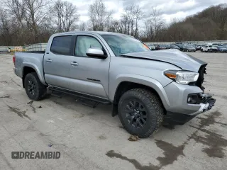 2023 Toyota Tacoma SR5 с VIN 3TMAZ5CN0PM201788, выставлен на аукционе Copart как лот 51878365 с пробегом 50 468 миль миль и На запчасти • Non repairable. История ставок и продаж доступна на DreamBid. Изображение 4.