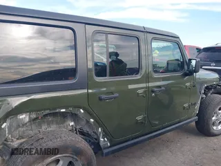 2021 Jeep Wrangler Unlimited Sport S with VIN 1C4HJXDN6MW669228, listed as a IAAI auction lot 42301326 with 64,503 mi miles and . Bid and sale history available at DreamBid. Image 13.