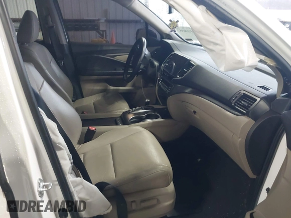 2021 Honda Pilot EX-L with VIN 5FNYF5H57MB022843, listed as a IAAI auction lot 41186957 with 57,836 mi miles. Bid and sale history available at carsss.com. Image 5.