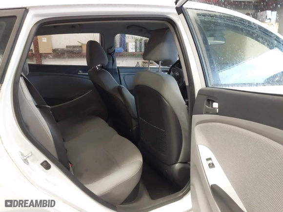 2013 Hyundai Accent GL with VIN KMHCT5AE6DU122559, listed as a IAAI auction lot 41800714 with 129,582 mi miles. Bid and sale history available at carsss.com. Image 8.