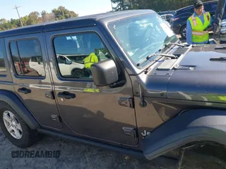 2020 Jeep Wrangler Unlimited Sport S with VIN 1C4HJXDG1LW237405, listed as a IAAI auction lot 40631451 with 60,256 mi miles and . Bid and sale history available at DreamBid. Image 13.
