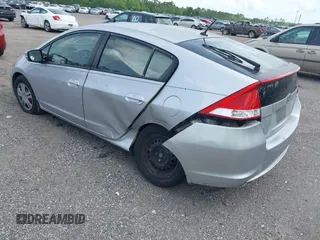 2010 Honda Insight LX with VIN JHMZE2H52AS038807, listed as a IAAI auction lot 42120846 with 242,816 mi miles and . Bid and sale history available at DreamBid. Image 3.