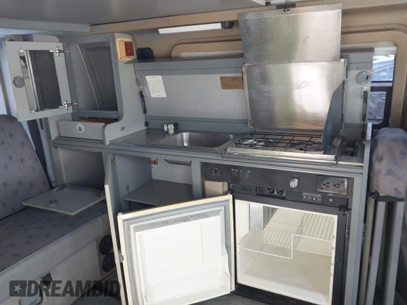 1997 Volkswagen EuroVan CV с VIN WV2EH8705VH077041, выставлен на аукционе IAAI как лот 42481515 с пробегом 144 миль миль и . История ставок и продаж доступна на DreamBid. Изображение 13.