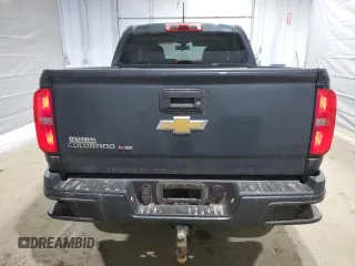 2019 Chevrolet Colorado 4WD Work Truck z VIN 1GCGTBEN2K1240251, wystawiony jako Copart lot #48980085 z przebiegiem 141 759 mil mil oraz Szkoda całkowita • Salvage title. Historia ofert i sprzedaży dostępna na DreamBid. Obrazek 6.