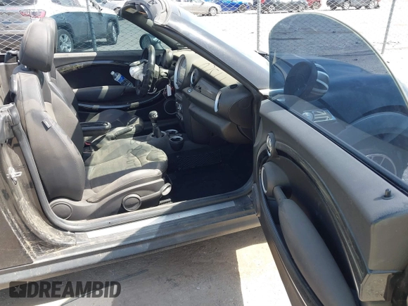 2012 MINI Roadster S with VIN WMWSY3C56CT144520, listed as a IAAI auction lot 41818205 with 86,836 mi miles and . Bid and sale history available at DreamBid. Image 5.
