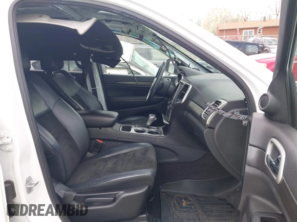 2018 Jeep Grand Cherokee Laredo z VIN 1C4RJFAG1JC479838, wystawiony jako IAAI lot #41903955 z przebiegiem 73 076 mil mil oraz . Historia ofert i sprzedaży dostępna na DreamBid. Obrazek 5.