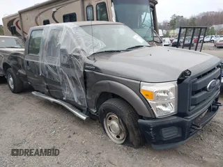 2013 Ford F-250 XL z VIN 1FT7W2A64DEB20551, wystawiony jako IAAI lot #41731321 z przebiegiem 5 mil mil oraz . Historia ofert i sprzedaży dostępna na DreamBid. Obrazek 1.