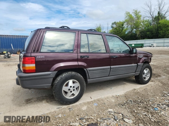 1994 Jeep Grand Cherokee Laredo z VIN 1J4GZ58S0RC221854, wystawiony jako Copart lot #61950825 z przebiegiem 69 465 mil mil oraz Czysty tytuł • Clean title. Historia ofert i sprzedaży dostępna na DreamBid. Obrazek 3.
