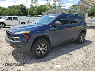 2014 Jeep Cherokee Trailhawk z VIN 1C4PJMBS7EW170345, wystawiony jako Copart lot #60565765 z przebiegiem 98 382 mil mil oraz Szkoda całkowita • Salvage title. Historia ofert i sprzedaży dostępna na DreamBid. Obrazek 1.