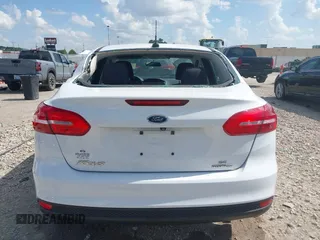 2015 Ford Focus SE with VIN 1FADP3F2XFL335884, listed as a IAAI auction lot 42582740 with 102,036 mi miles and . Bid and sale history available at DreamBid. Image 16.