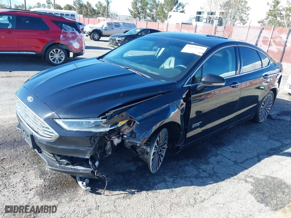 2017 Ford Fusion Energi Titanium with VIN 3FA6P0SU1HR116976, listed as a IAAI auction lot 39028290 with 86,678 mi miles. Bid and sale history available at carsss.com. Image 18.