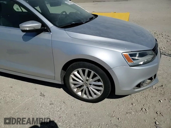 2011 Volkswagen Jetta SEL with VIN 3VWLZ7AJXBM056107, listed as a Copart auction lot 69955534 with 104,451 mi miles and Salvage title. Bid and sale history available at DreamBid. Image 11.