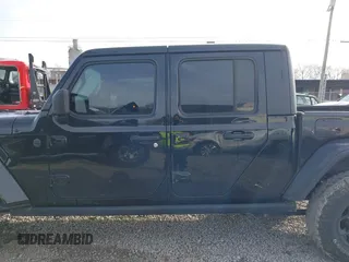 2023 Jeep Gladiator Sport S z VIN 1C6HJTAG7PL567903, wystawiony jako IAAI lot #41574387 z przebiegiem 49 378 mil mil oraz . Historia ofert i sprzedaży dostępna na DreamBid. Obrazek 14.