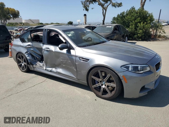 2014 BMW M5 z VIN WBSFV9C58ED593431, wystawiony jako Copart lot #54870555 z przebiegiem 172 191 mil mil oraz Szkoda całkowita • Salvage title. Historia ofert i sprzedaży dostępna na DreamBid. Obrazek 4.