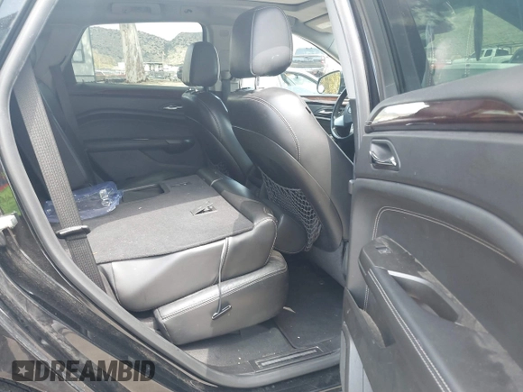 2012 Cadillac SRX Luxury Collection with VIN 3GYFNAE38CS635205, listed as a IAAI auction lot 41970482 with 220,593 mi miles and . Bid and sale history available at DreamBid. Image 8.