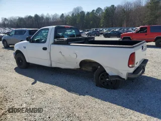 2003 Ford F-150 XL with VIN 2FTRF17WX3CB10461, listed as a Copart auction lot 48663195 with 94,954 mi miles and Salvage Title. Bid and sale history available at DreamBid. Image 2.