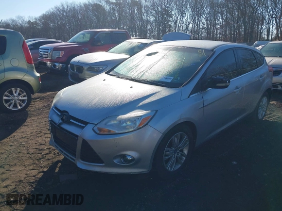 2012 Ford Focus SEL with VIN 1FAHP3M28CL162768, listed as a IAAI auction lot 41682973 with 999,999 mi miles. Bid and sale history available at carsss.com. Image 2.