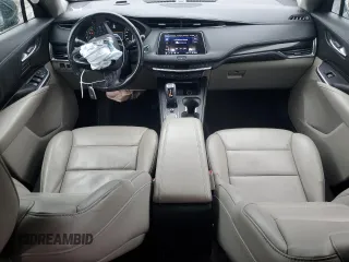 2019 Cadillac XT4 FWD Premium Luxury with VIN 1GYFZCR47KF152164, listed as a Copart auction lot 44705115 with 99,115 mi miles and Salvage Title. Bid and sale history available at carsss.com. Image 8.