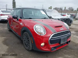 2014 MINI Cooper Hardtop S with VIN WMWXM7C51ET985947, listed as a IAAI auction lot 41648463 with 99,152 mi miles. Bid and sale history available at carsss.com. Image 1.