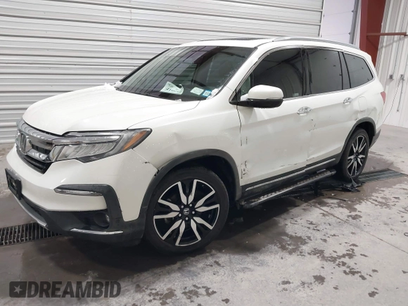 2019 Honda Pilot Touring 7-Passenger with VIN 5FNYF6H64KB005798, listed as a IAAI auction lot 41551933 with 103,151 mi miles. Bid and sale history available at carsss.com. Image 17.