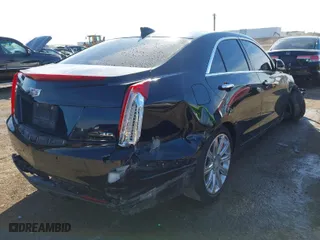 2015 Cadillac ATS Luxury with VIN 1G6AB5S39F0132415, listed as a IAAI auction lot 41348641 with 144,447 mi miles. Bid and sale history available at carsss.com. Image 4.
