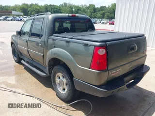 2001 Ford Explorer Sport Trac with VIN 1FMZU67E61UB92823, listed as a IAAI auction lot 42513900 with 186,525 mi miles and . Bid and sale history available at DreamBid. Image 3.