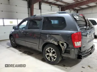 2014 Kia Sedona LX with VIN KNDMG4C77E6541368, listed as a Copart auction lot 52749305 with 130,253 mi miles and Salvage Title. Bid and sale history available at carsss.com. Image 2.