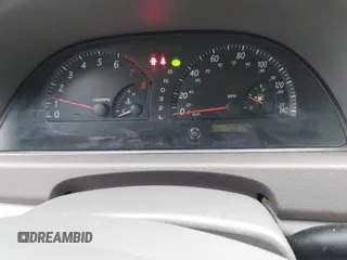 2003 Toyota Camry LE z VIN 4T1BF30KX3U049919, wystawiony jako IAAI lot #42148543 z przebiegiem 208 140 mil mil oraz . Historia ofert i sprzedaży dostępna na DreamBid. Obrazek 6.