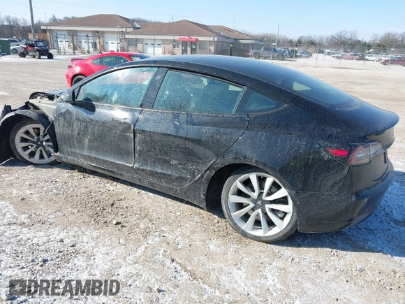 2022 Tesla Model 3 with VIN 5YJ3E1EA1NF304811, listed as a IAAI auction lot 41559342 with 29,597 mi miles and . Bid and sale history available at DreamBid. Image 3.