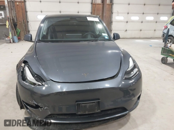 2023 Tesla Model Y Long Range with VIN 7SAYGAEE2PF755674, listed as a IAAI auction lot 41890025 with 24,783 mi miles and . Bid and sale history available at DreamBid. Image 12.