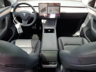 2024 Tesla Model Y Long Range with VIN 7SAYGDEE3RA256304, listed as a Copart auction lot 56160535 with 20,224 mi miles and Salvage title. Bid and sale history available at DreamBid. Image 8.