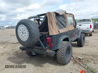 1993 Jeep Wrangler "S" with VIN 1J4FY19P5PP254999, listed as a IAAI auction lot 41742888 with 189,678 mi miles. Bid and sale history available at carsss.com. Image 4.