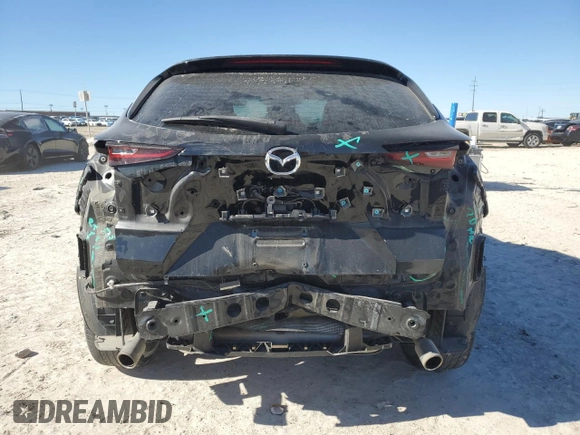 2020 Mazda CX-30 with VIN 3MVDMABL7LM135463, listed as a Copart auction lot 84154914 with 60,708 mi miles and Salvage Title. Bid and sale history available at DreamBid. Image 6.