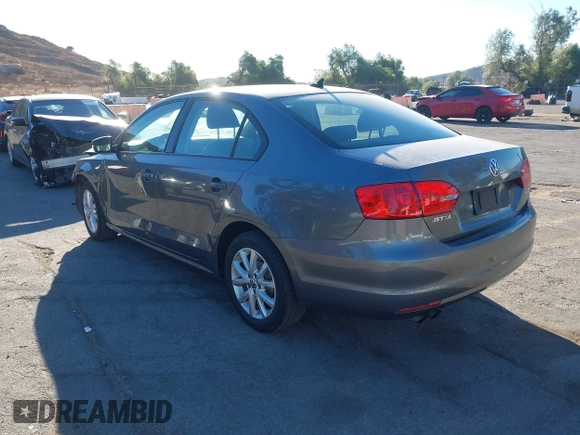 2011 Volkswagen Jetta SE with VIN 3VWDZ7AJ7BM318623, listed as a IAAI auction lot 41131568 with 130,799 mi miles and . Bid and sale history available at DreamBid. Image 3.