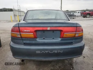 2002 Saturn LS z VIN 1G8JU54F72Y581967, wystawiony jako Copart lot #74521994 z przebiegiem 215 018 mil mil oraz Szkody całkowita. Historia ofert i sprzedaży dostępna na DreamBid. Obrazek 6.