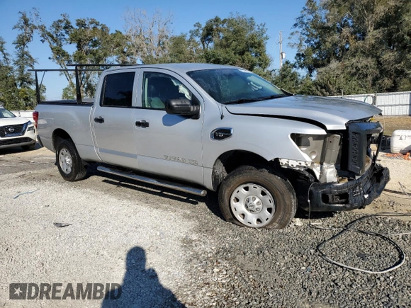 2017 Nissan Titan with VIN 1N6AA1F13HN552434, listed as a Copart auction lot 83294434 with 199,500 mi miles and Salvage title. Bid and sale history available at DreamBid. Image 4.