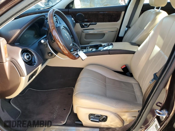 2014 Jaguar XJ with VIN SAJWA1CZ3E8V69877, listed as a Copart auction lot 48159005 with 57,567 mi miles and Clean Title. Bid and sale history available at DreamBid. Image 7.