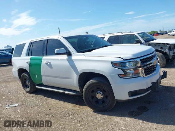 2015 Chevrolet Tahoe Commercial z VIN 1GNLC2EC8FR255526, wystawiony jako IAAI lot #42538320 z przebiegiem 165 502 mil mil oraz . Historia ofert i sprzedaży dostępna na DreamBid. Obrazek 13.