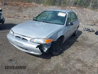 2002 Ford Escort Fleet Standard z VIN 3FAFP13P12R209941, wystawiony jako IAAI lot #41790208 z przebiegiem 112 422 mil mil oraz . Historia ofert i sprzedaży dostępna na DreamBid. Obrazek 6.
