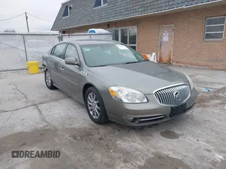 2011 Buick Lucerne CXL Premium with VIN 1G4HJ5EM0BU104715, listed as a IAAI auction lot 41706751 with 123,636 mi miles. Bid and sale history available at carsss.com. Image 1.