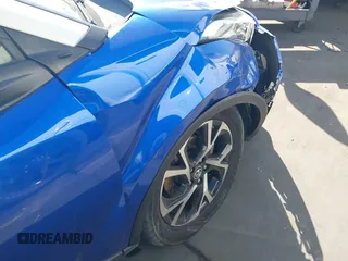 2019 Toyota C-HR XLE with VIN JTNKHMBX5K1043079, listed as a IAAI auction lot 41813367 with 77,879 mi miles and . Bid and sale history available at DreamBid. Image 19.
