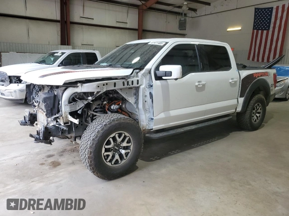 2023 Ford F-150 Raptor with VIN 1FTFW1RG5PFB97799, listed as a Copart auction lot 47471485 with 27,282 mi miles and Salvage Title. Bid and sale history available at DreamBid. Image 1.